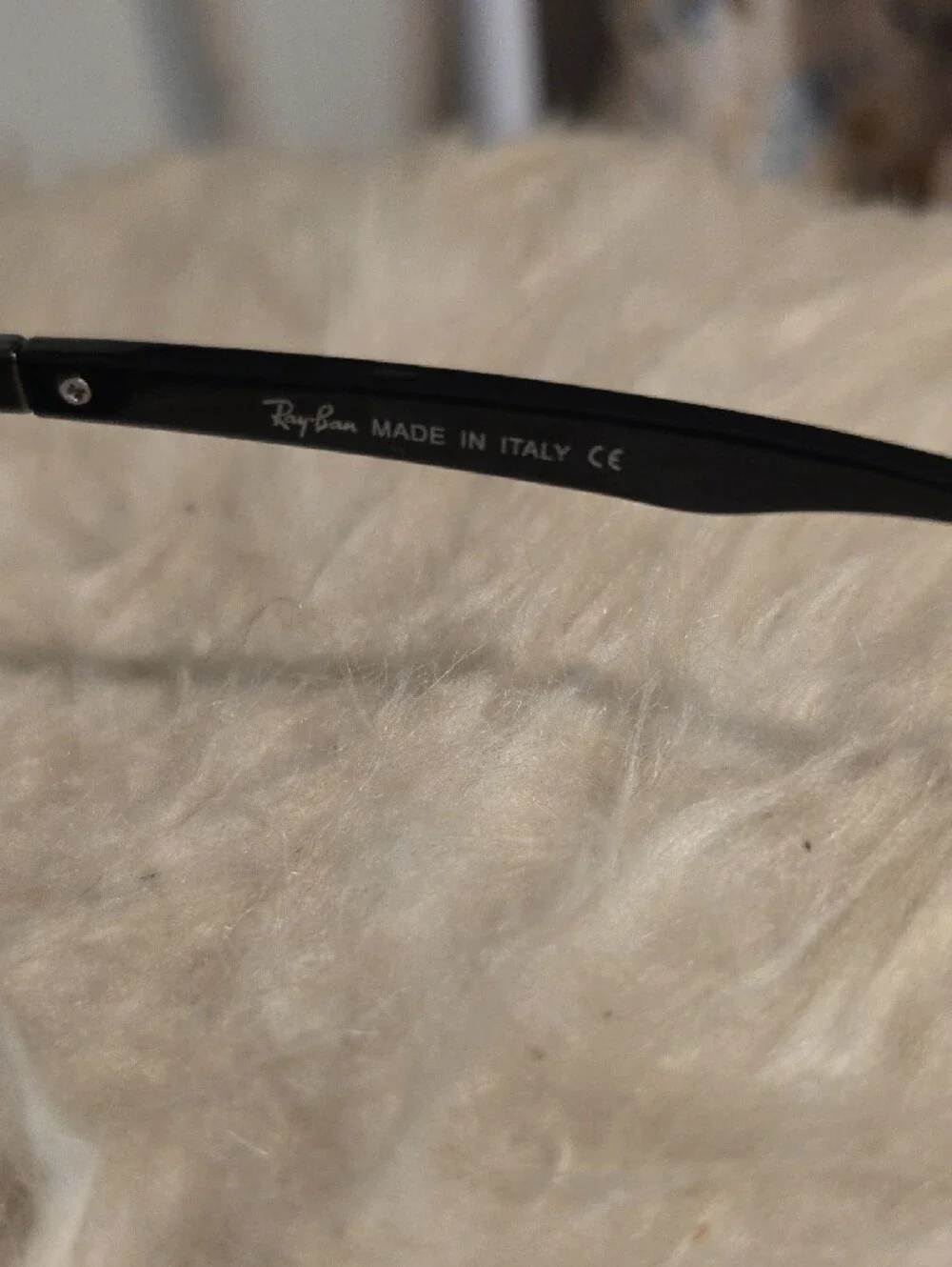 Ray-Ban Black Frame Sunglasses with Blue Mirrored Lenses